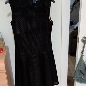 Gabby Skye Textured Black Sleeveless Dress